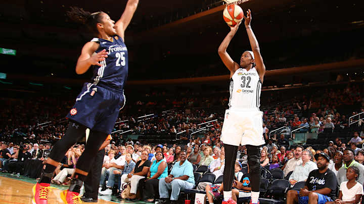 Charles' 22 points, 12 rebounds leads Liberty past Sun