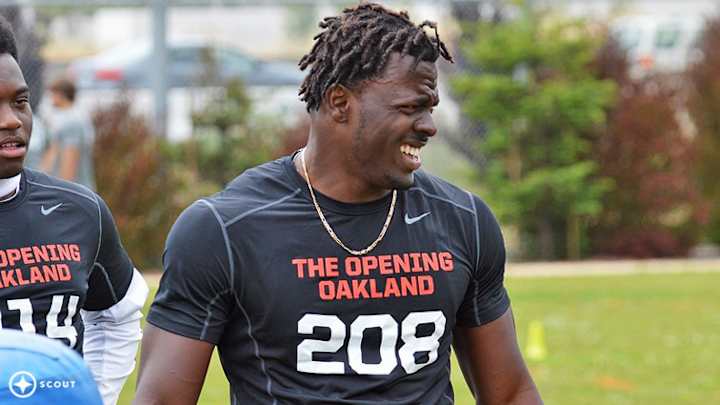 Clay Helton scores big recruiting victory with DE Oluwole Betiku Clay Helton scores big recruiting victory with DE Oluwole Betiku