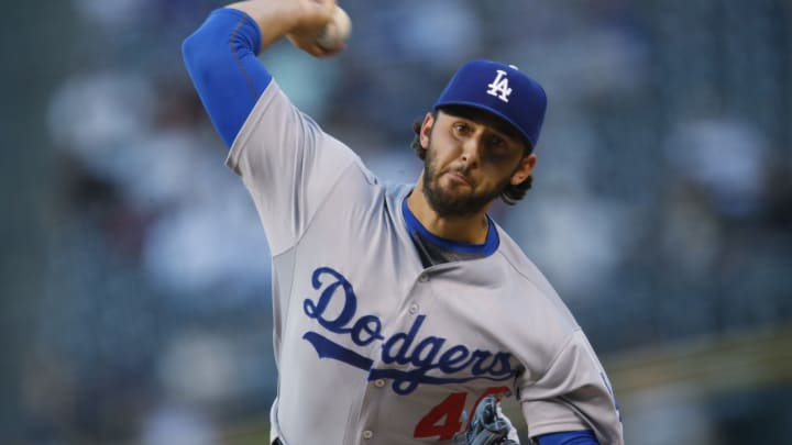 Rockies hit 3 homers in 4th inning, beat Dodgers 7-4