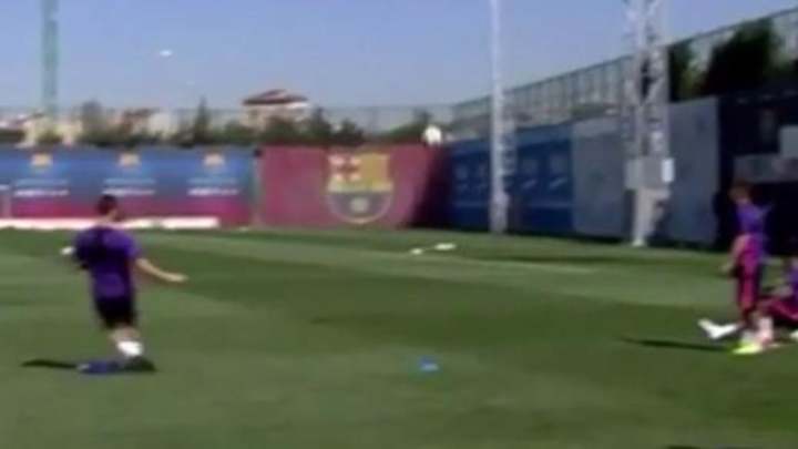 Barcelona player kicks ball into basketball hoop from long range