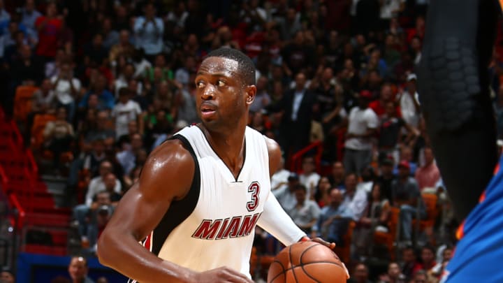Wade's 28 lifts Miami over OKC in wild game, 97-95