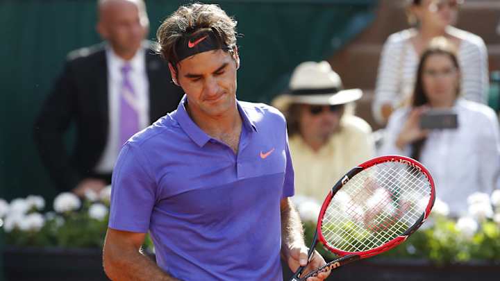 Federer upset by Wawrinka; Tsonga wins; Ivanovic, Safarova advance Federer upset by Wawrinka; Tsonga wins; Ivanovic, Safarova advance