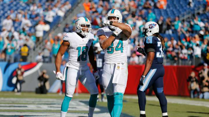 Dolphins rout Titans 38-10 in Dan Campbell's coaching debut