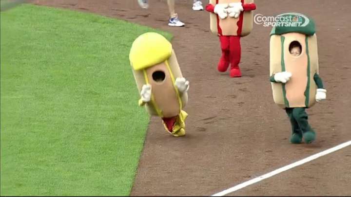 A runner in the Royals hot dog race was foiled by his pants falling down