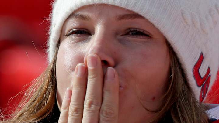 AP PHOTOS: Olympians bestow Sochi smooches