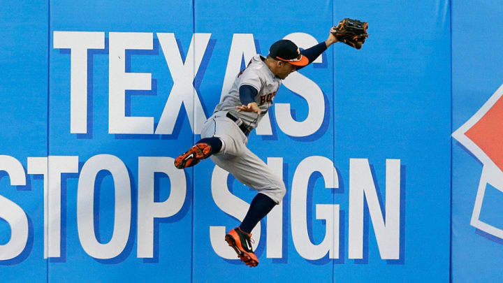Astros' George Springer crashes into the wall while making ridiculous catch