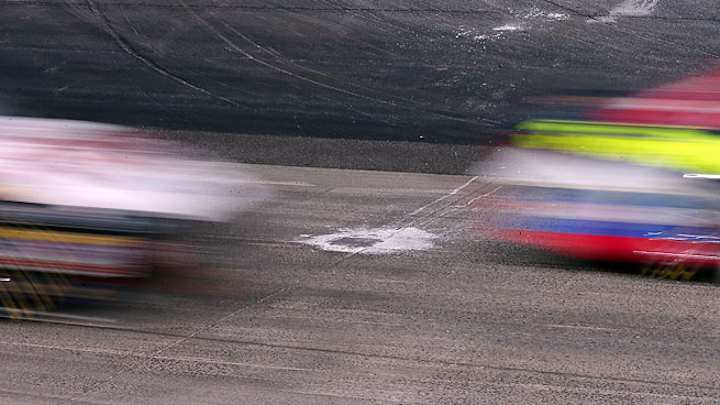Potholes on track temporarily red-flag NASCAR race at Dover