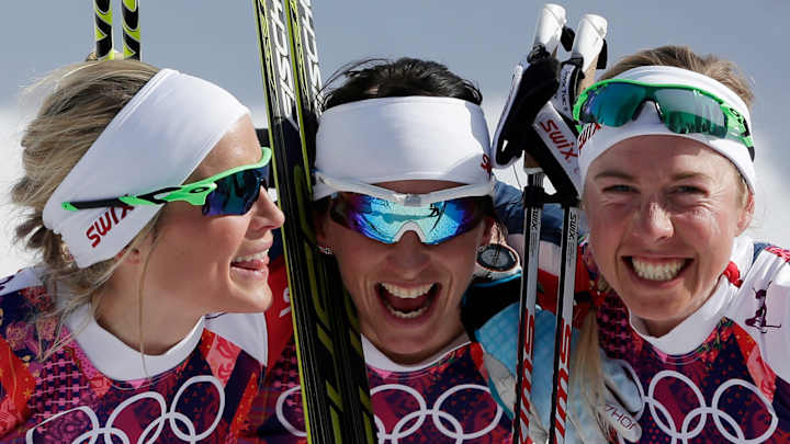 Bjoergen leads Norway sweep in 30K cross-country, sets medal record