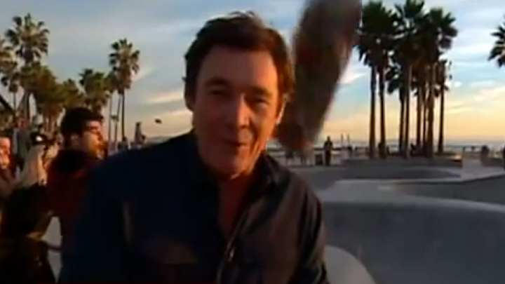 Reporter gets nailed by flying skateboard