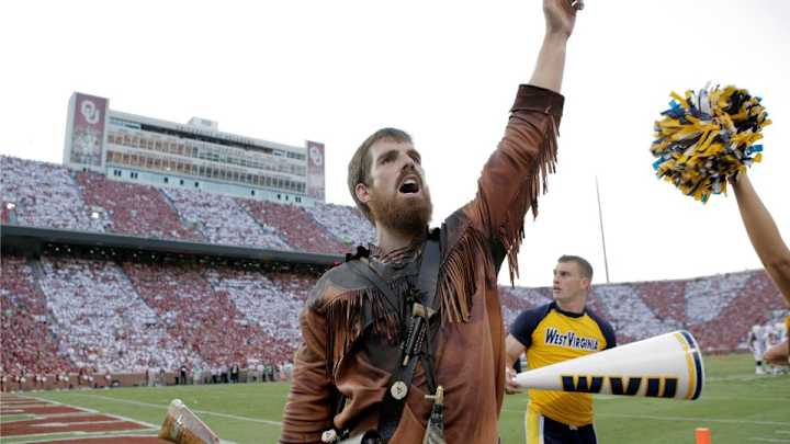 West Virginia players turn locker room into pro wrestling ring