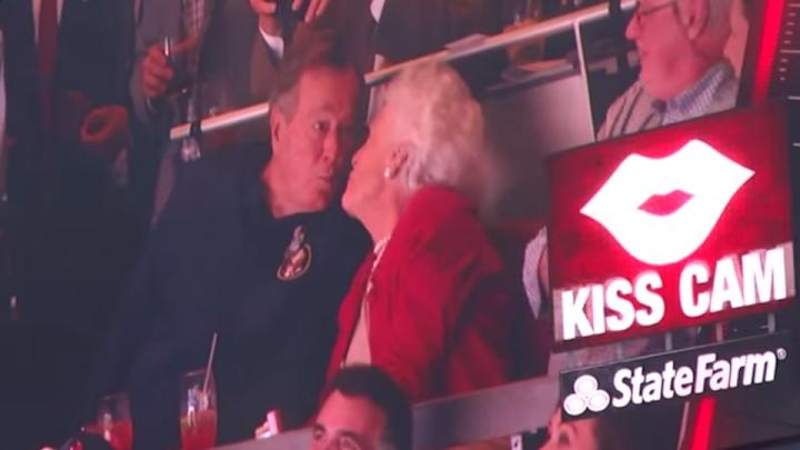 Former president George H.W. Bush and wife Barbara caught on kiss cam