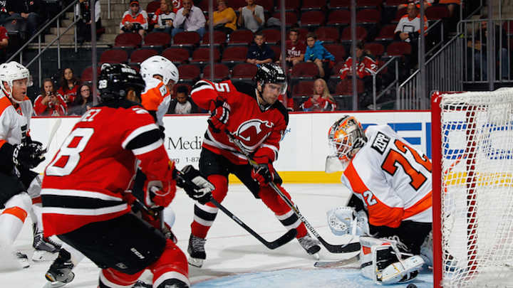 Devils re-sign center Scott Gomez