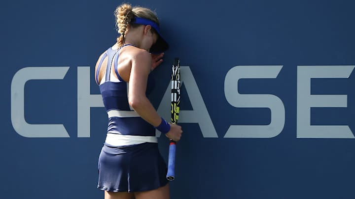 Bouchard ousted in quarters while Murray, Djokovic advance on Day 8