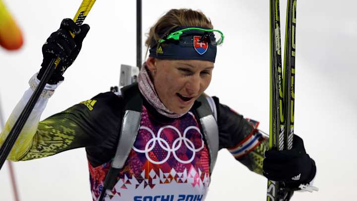 Defending champion Kuzmina wins biathlon gold Defending champion Kuzmina wins biathlon gold