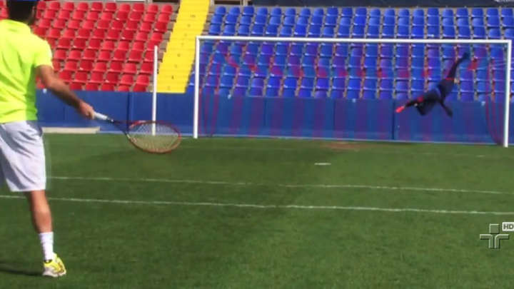 Watch Costa Rica's goalie block tennis balls hit at him by pro tennis player Pablo Andujay