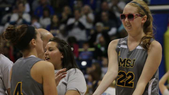 Lauren Hill scores in first home game
