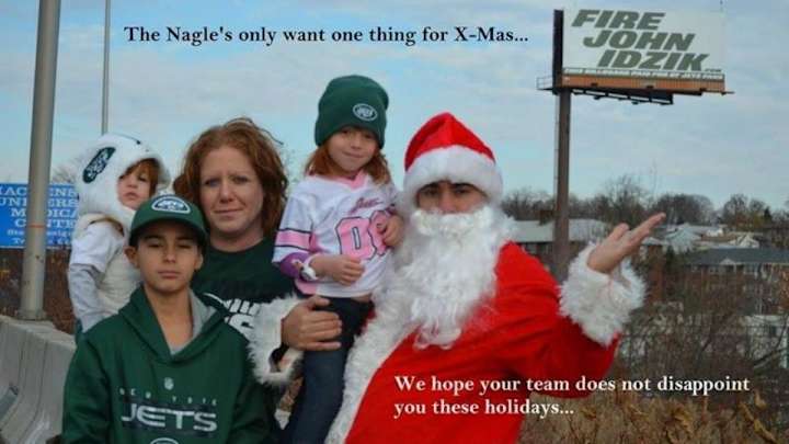 Family of Jets fans' Christmas card features 'Fire John Idzik' billboard