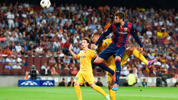 Pique scores only goal as Barcelona tops APOEL, 1-0
