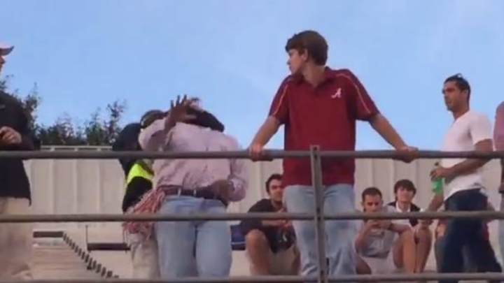 Alabama fan throws trash at Ole Miss fan, receives clothesline