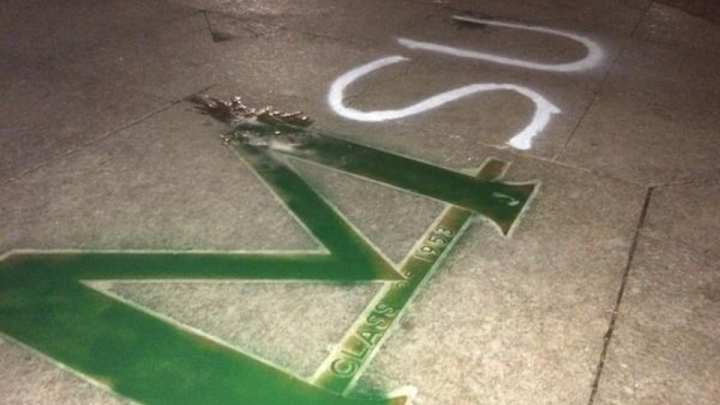 Michigan State fans paint Michigan landmark green