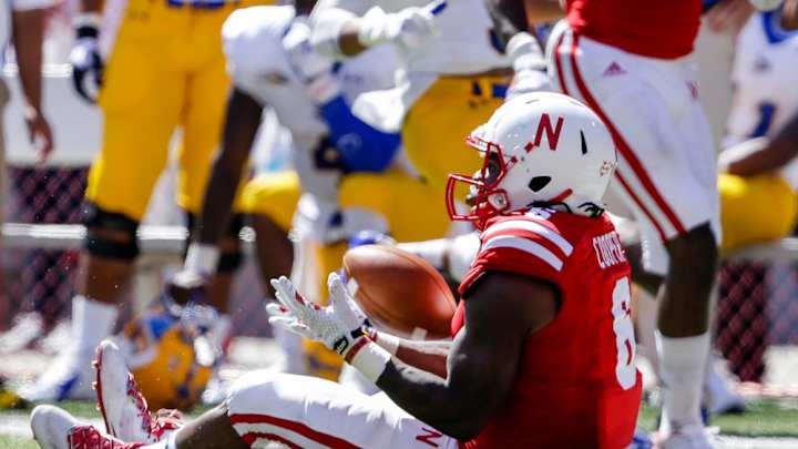 Nebraska S Corey Cooper vomits on field, keeps playing
