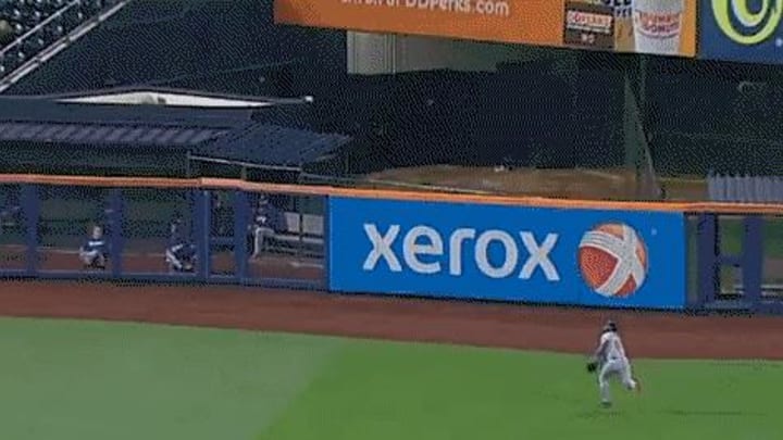 Yasiel Puig steals a double from Mets' Wilmer Flores with diving catch Yasiel Puig steals a double from Mets' Wilmer Flores with diving catch