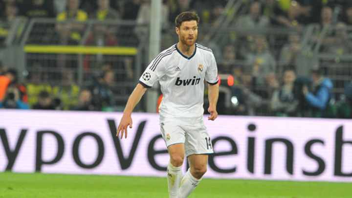 Xabi Alonso signs 2-year extension with Real Madrid Xabi Alonso signs 2-year extension with Real Madrid