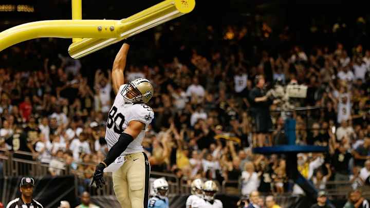 Saints' Jimmy Graham flagged twice for dunking over goalpost