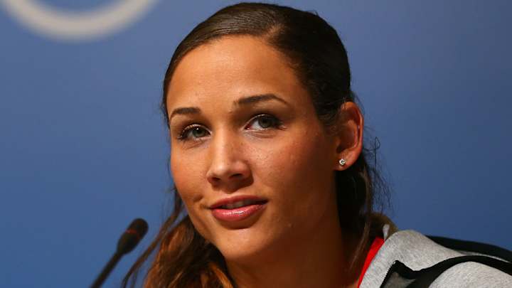 US bobsledder Lolo Jones fighting off cold, flu