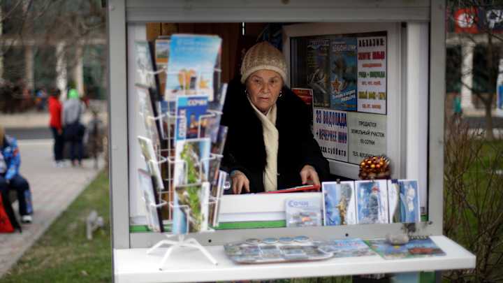 Sochi's merchants ride Putin's Olympic dream