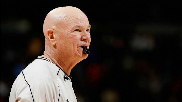 Ref Joey Crawford waves off basket with some flair