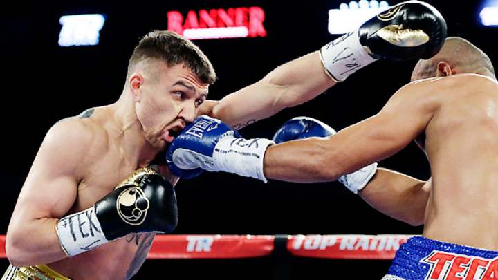 Olympian Lomachenko loses fight, gains experience and second title shot