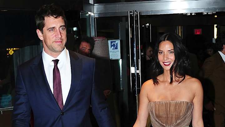 Watch this Packers fan react to receiving a signed jersey from Aaron Rodgers and Olivia Munn