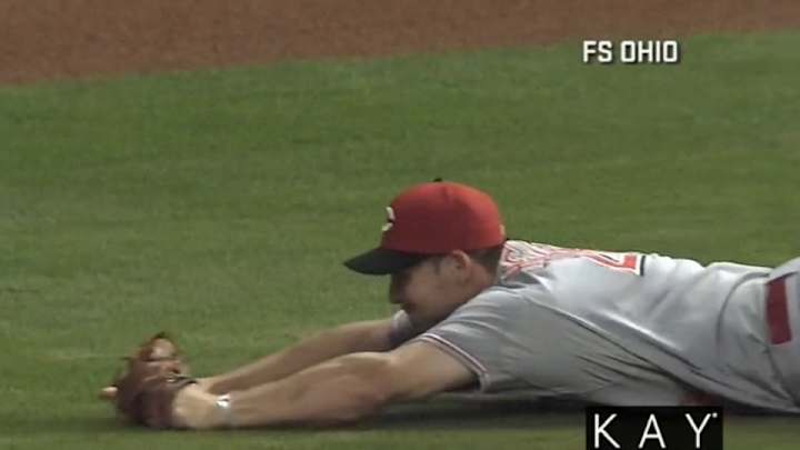 Reds OF Chris Heisey left the field with a lost contact, made an amazing catch when he returned
