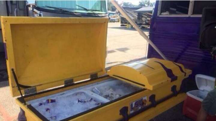 Here is an LSU-themed coffin filled with beer Here is an LSU-themed coffin filled with beer