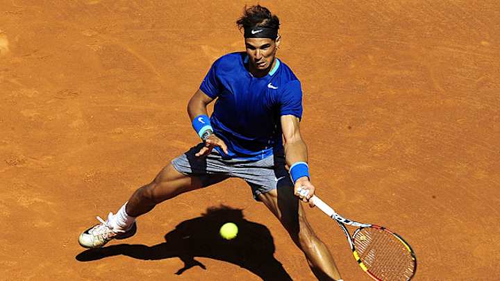 Rafael Nadal advances, David Ferrer loses at the Barcelona Open