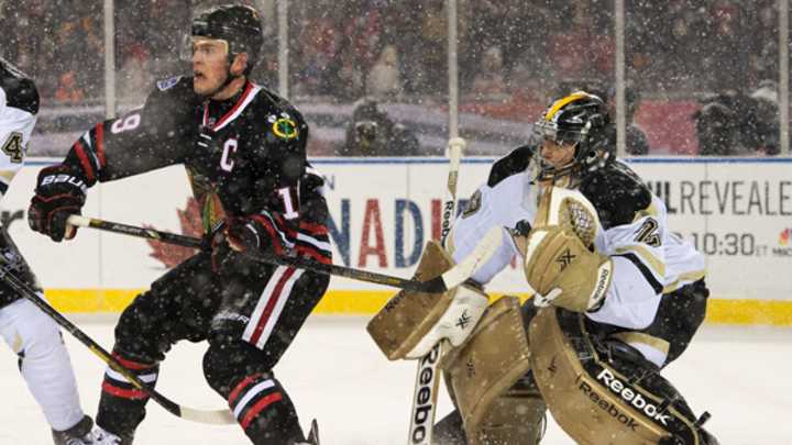 Blackhawks topple Penguins in Soldier Field's wintry wonderland Blackhawks topple Penguins in Soldier Field's wintry wonderland