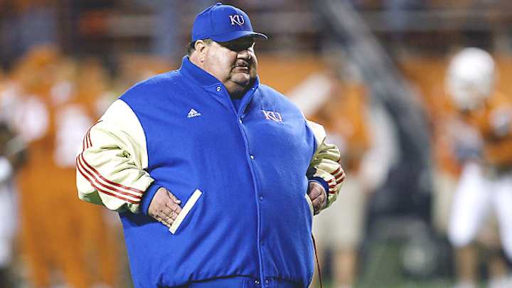 Iowa State hires ex-Kansas coach Mangino as offensive coordinator