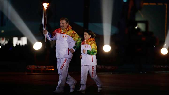 Olympic greats Tretiak, Rodnina light cauldron Olympic greats Tretiak, Rodnina light cauldron