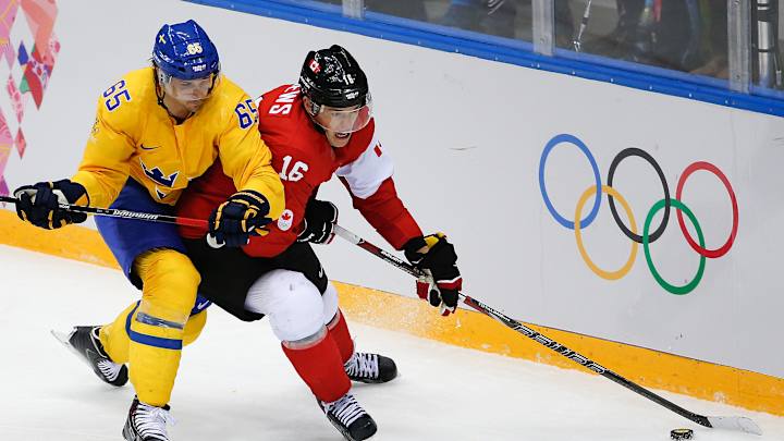 Canadians rule hockey as Olympic flame fades