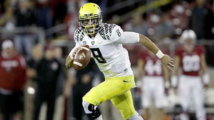 Oregon's Marcus Mariota, Hroniss Grasu announce they will return to school for 2014