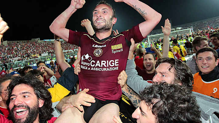 Livorno promoted back into Serie A with win over Empoli Livorno promoted back into Serie A with win over Empoli