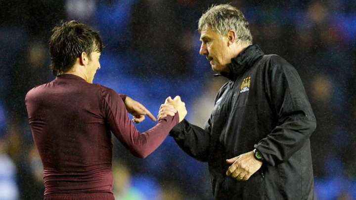 Manchester City secures 2nd place with 2-0 win at Reading