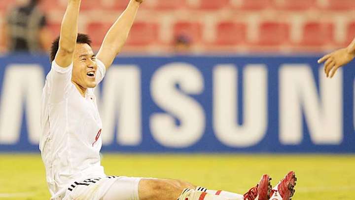 Japan ends Iraq's World Cup hopes; Iran wins