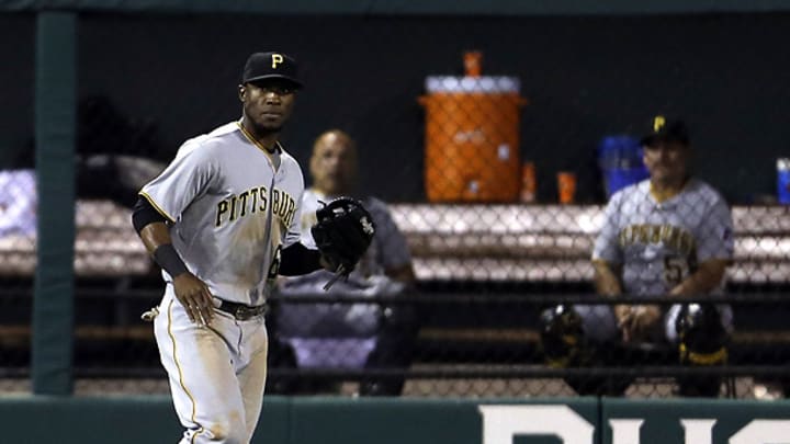 Dropped flyball helps Cardinals come back to beat Pirates