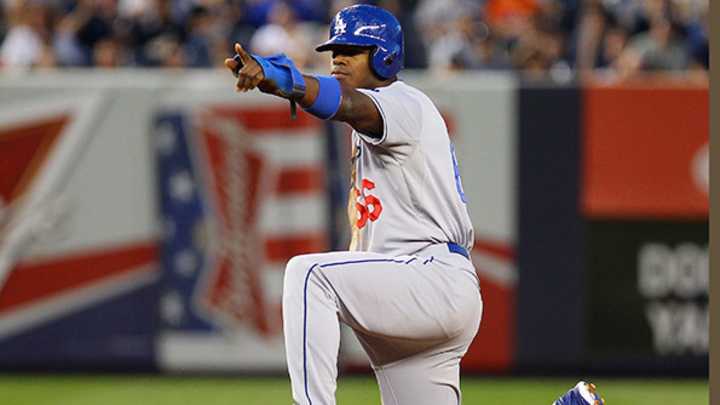 Here's Vin Scully Standing Arm in Arm with Yasiel Puig Dressed as Gumby