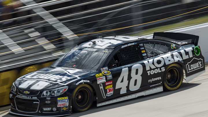 Johnson holds off Junior to win record 8th time at Dover