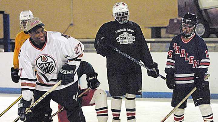 Police raid Georges Laraque's home