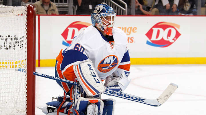 Poulin accepts Islanders' one-year qualifying offer Poulin accepts Islanders' one-year qualifying offer