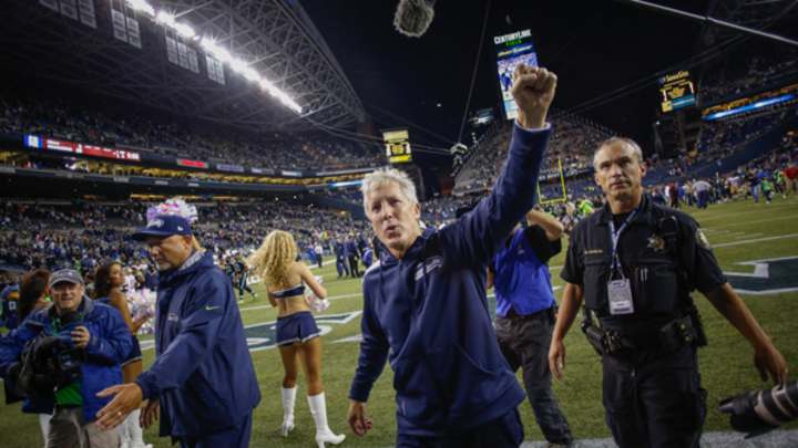 Seahawks manage hour-long weather delay, throttle 49ers with timely defense